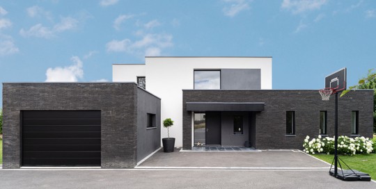 maison cubique enduit et briques noires